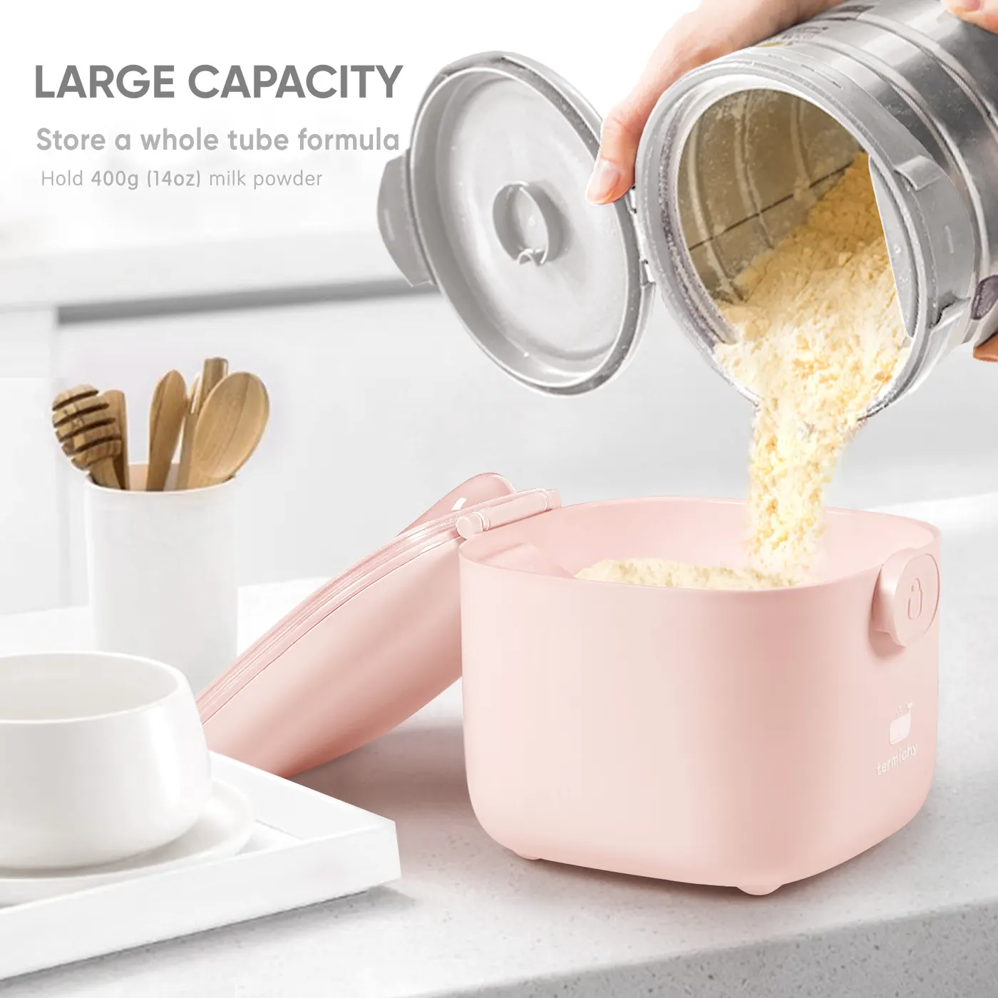 Side view of the formula dispenser showing the moulded handle