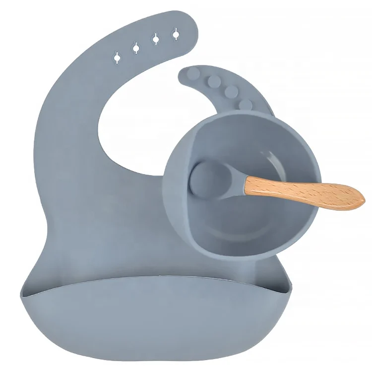 Adjustable silicone bib with four buttons and wide crumb catcher