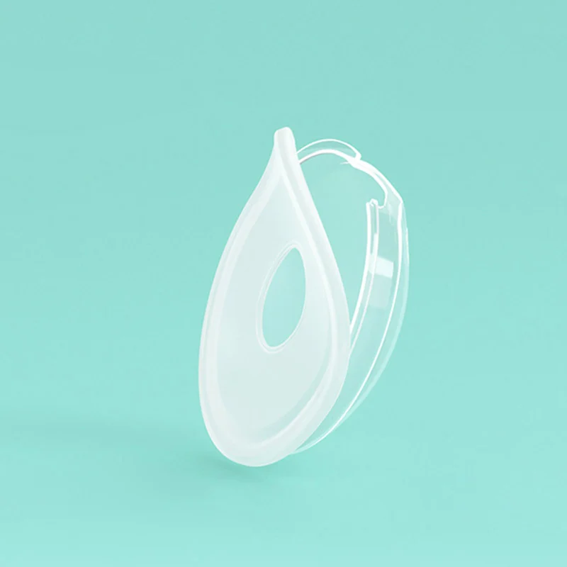 Close-up of one silicone breast collector showing the air vent and flexible edge