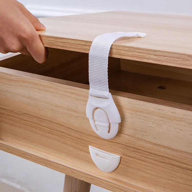 Drawer lock on a dresser drawer, showing the flat profile and clean fit