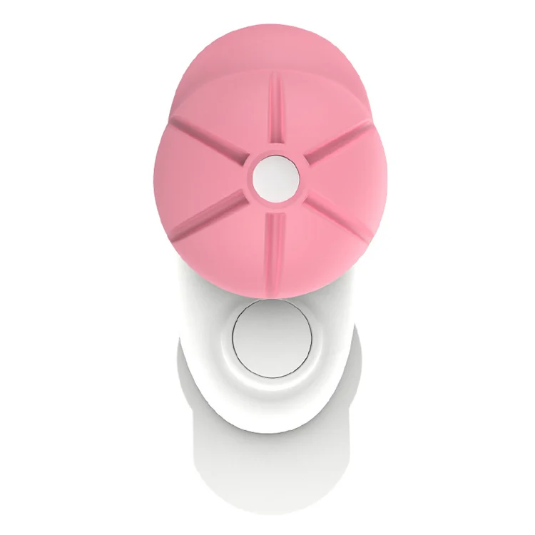 Black ABS plastic baby safety door stopper with silicone pads on a white blister card