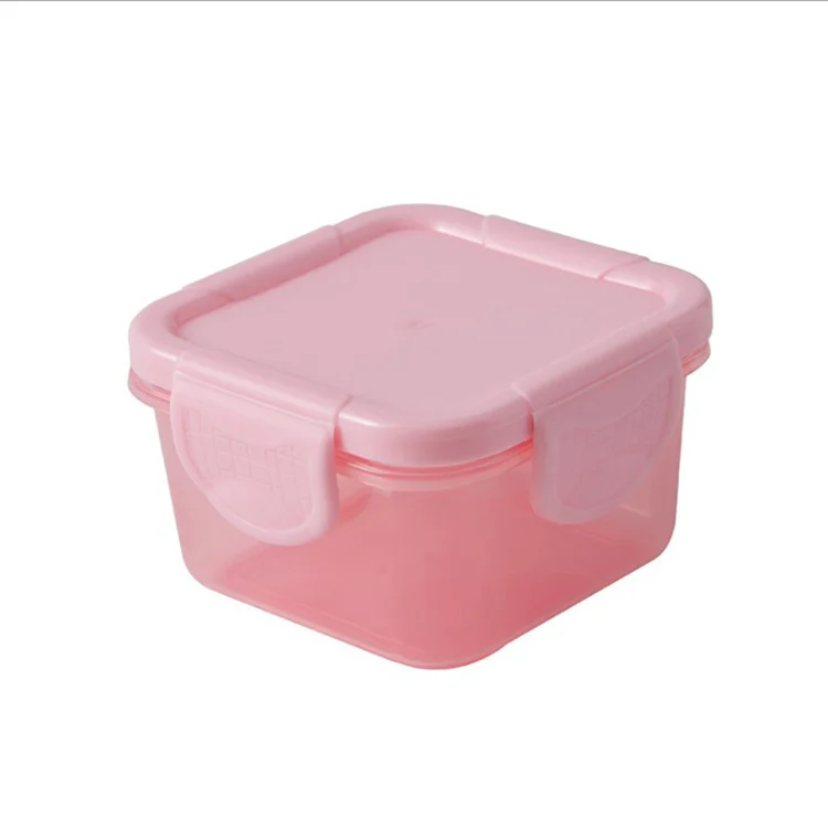 White plastic baby food storage box with lid removed, showing interior