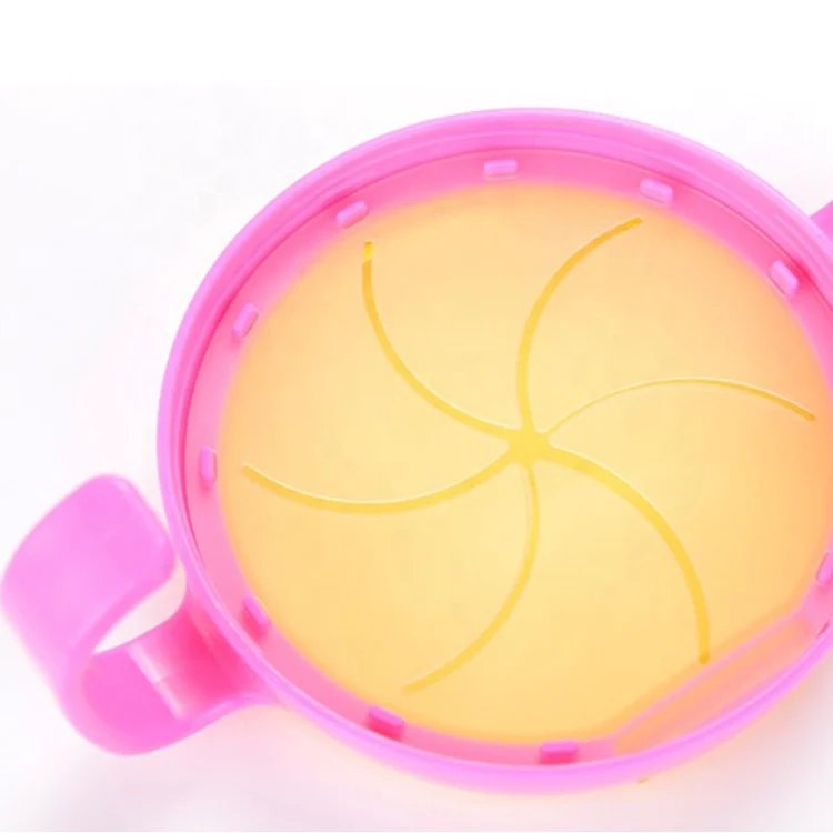 Green PP children snack container with lid removed, showing the spiral access flap