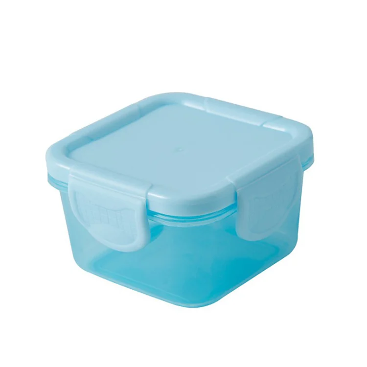 Plastic baby food container placed in a microwave for reheating