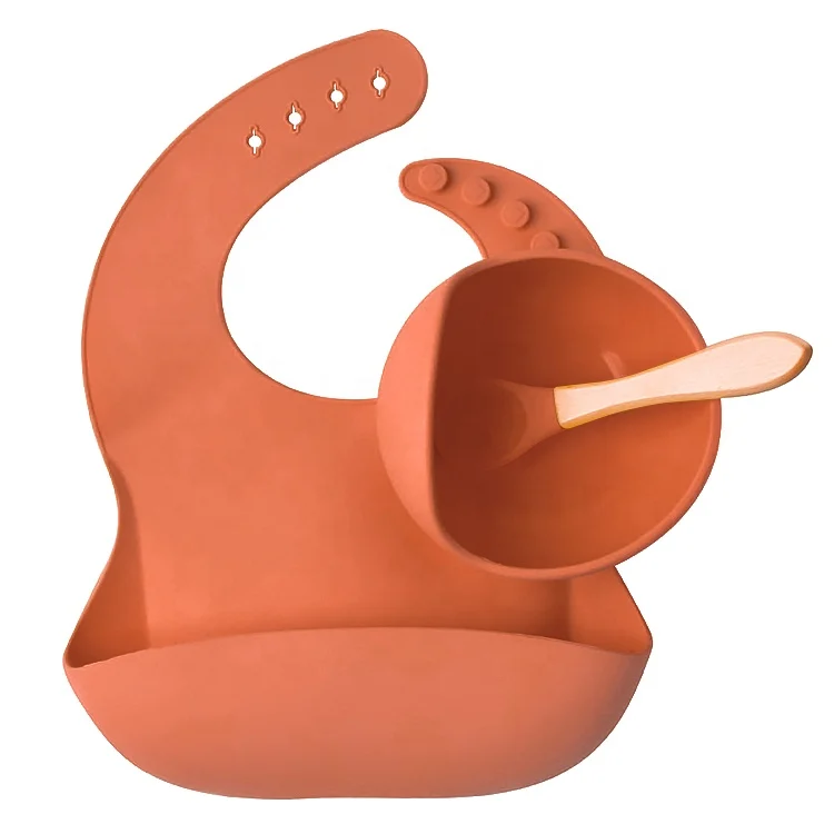 Bowl, spoon, and bib packed in an OPP bag with brand label