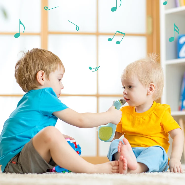 White kids audio player microphone with LED lights showing different colours