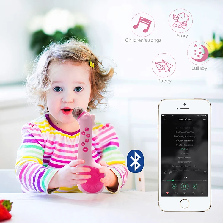 Yellow kids audio player microphone with soft LED glow in a dark room
