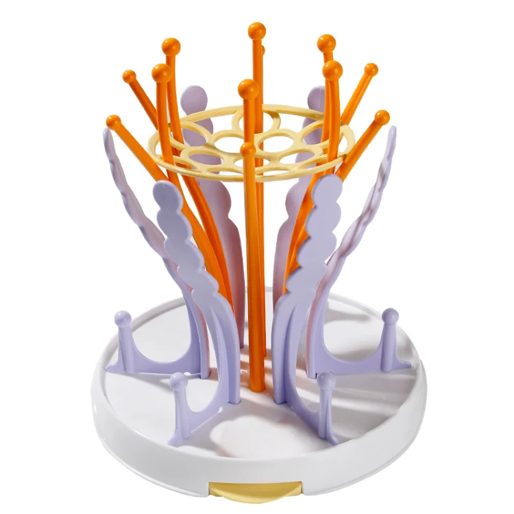 Blue baby bottle drying rack with bottles and nipples placed upright