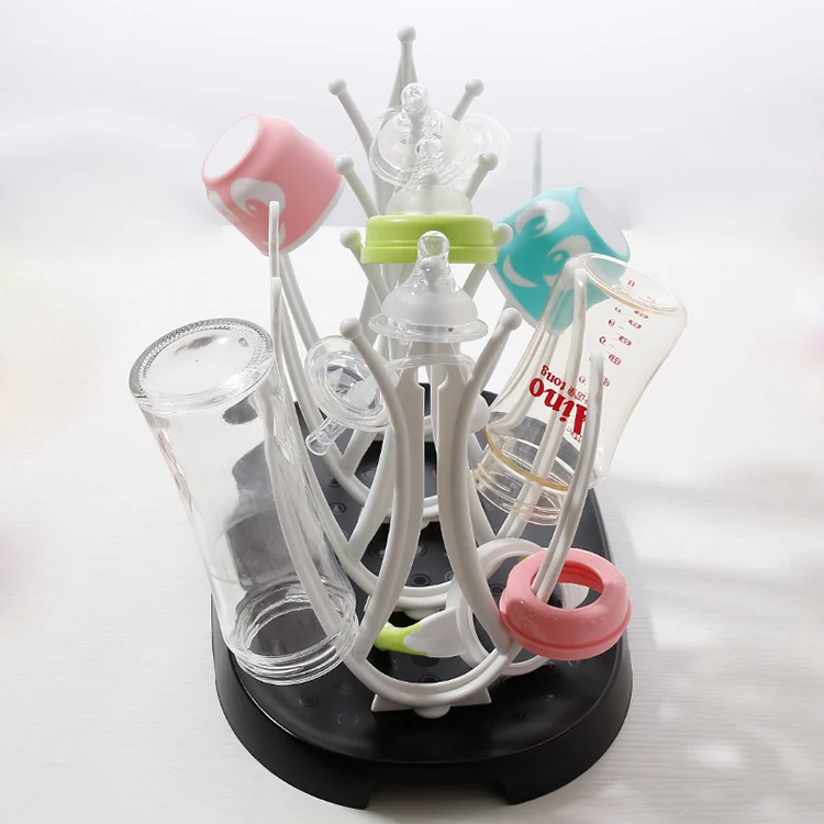 Baby bottle drying rack with the drip tray set to drain into the sink