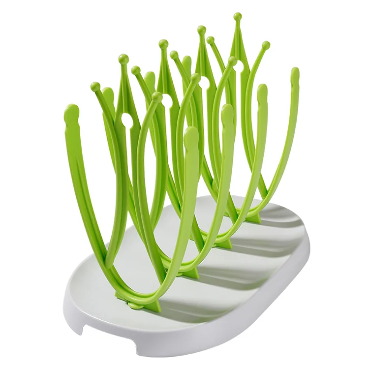 Green baby bottle drying rack with the drip tray removed