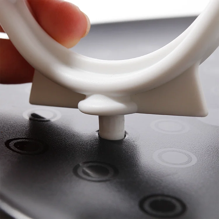 Close-up of the drip tray and base structure showing stability