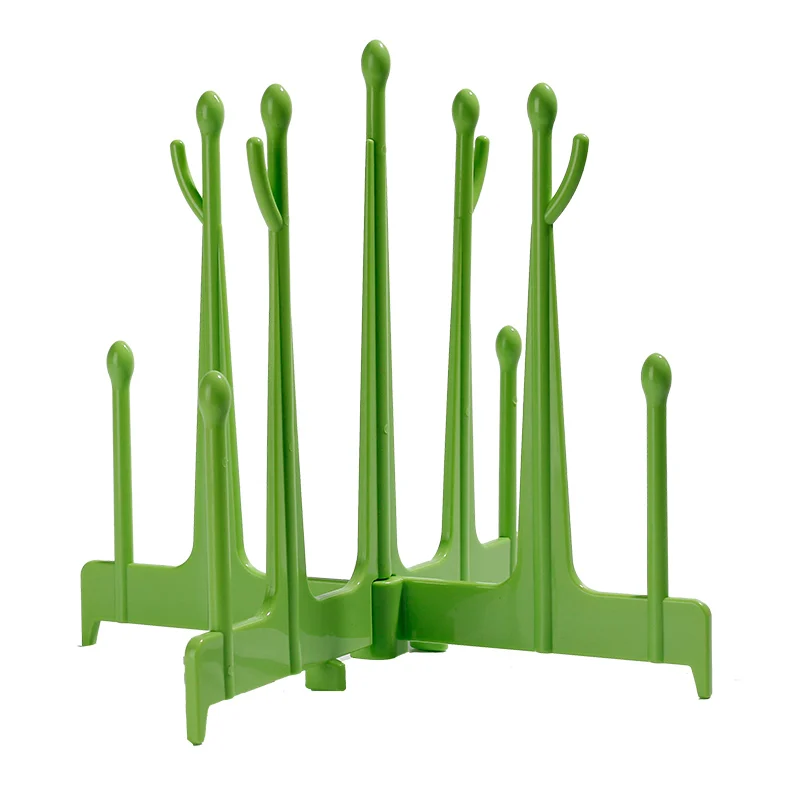 Green baby bottle drying rack viewed from the side, showing branch layout