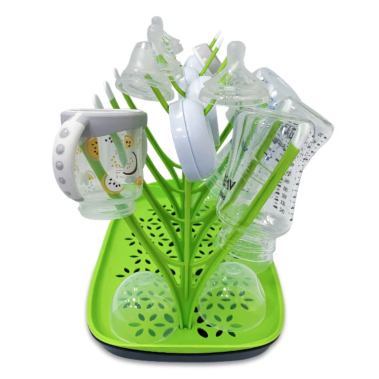 Drying rack with multiple bottles and accessories placed in the arms