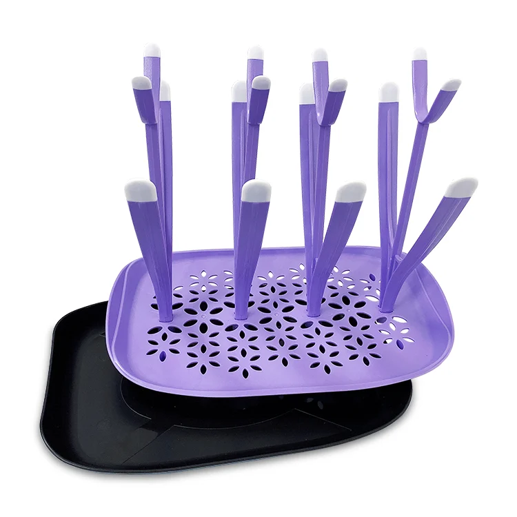 Drying rack with arms adjusted to fit a wide-neck bottle and a narrow-neck bottle