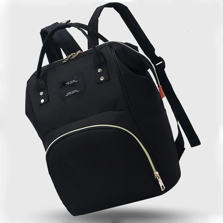 Diaper bag from the side, showing thickness and padded straps