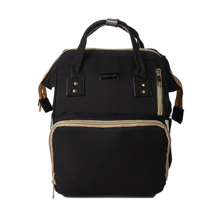 Bag open with internal pockets visible, including bottle holder and changing pad space