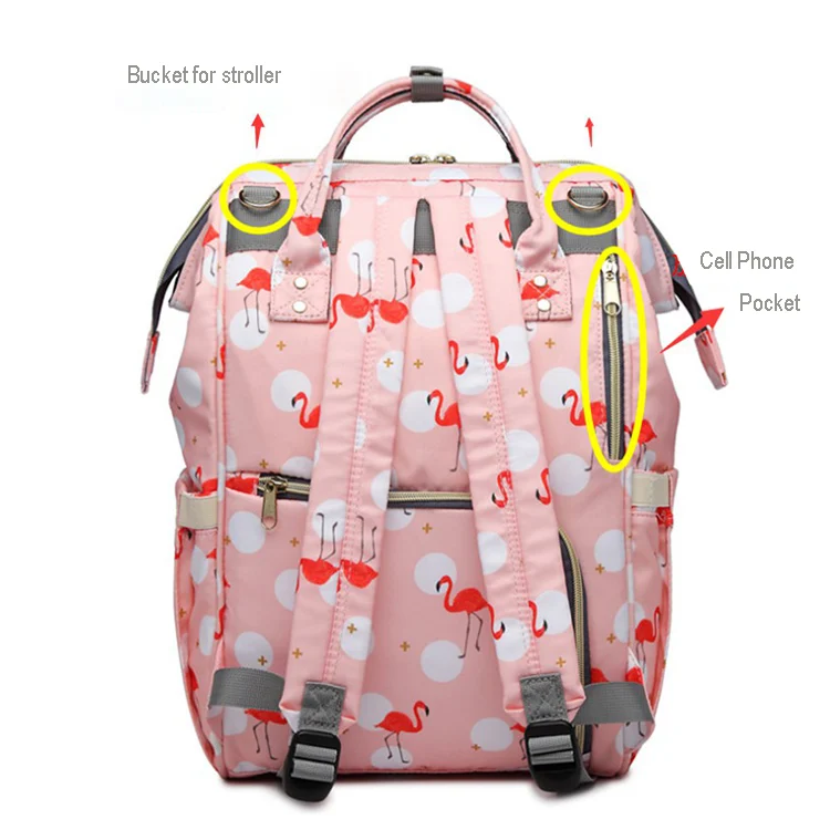 Diaper bag laid flat showing reinforced base and stitching