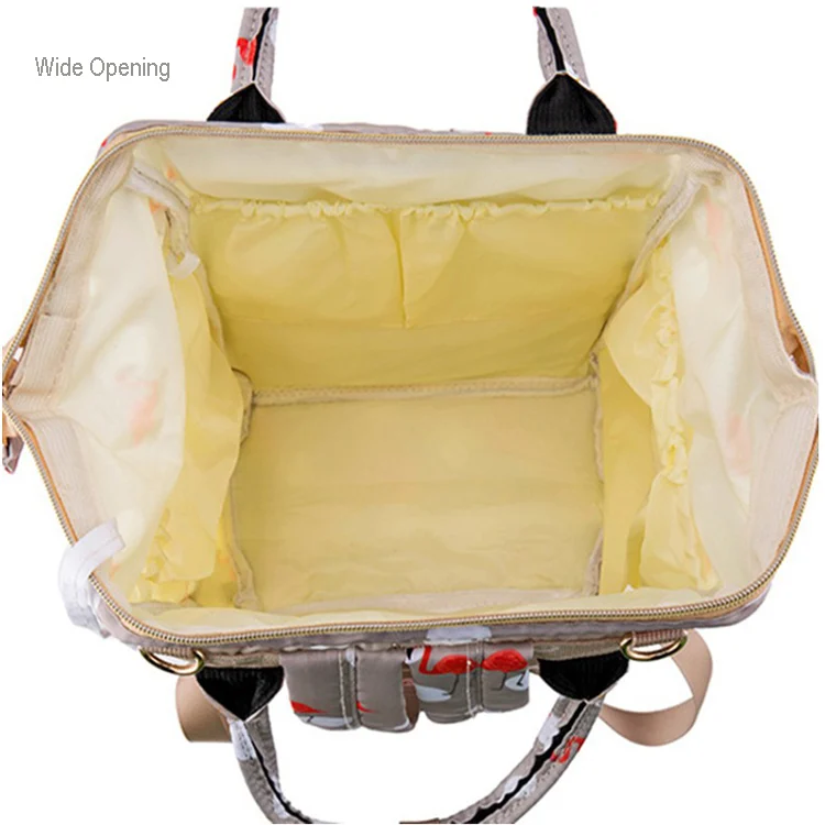 Diaper bag with multiple compartments and side water bottle holder