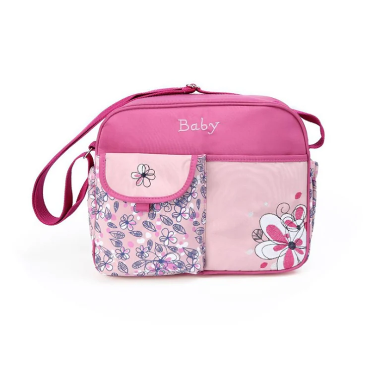 Mini baby nursery nappy diaper shoulder bag with open flap showing interior lining