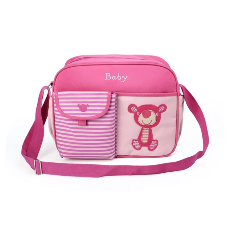 Grey mini baby nursery nappy diaper shoulder bag with flap closure and stroller handle loops