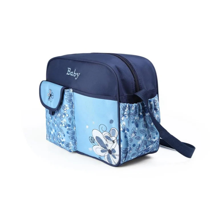 Green mini baby nursery nappy diaper shoulder bag with interior view showing storage compartments