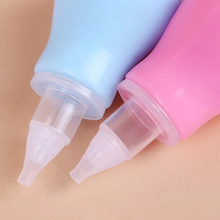 Set of three aspirators in Blue, Pink, and Yellow, laid out on a surface