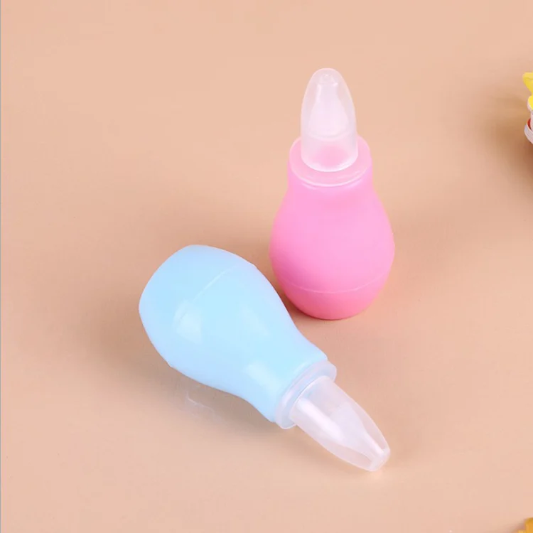 Baby nasal aspirator in use during bath time, showing gentle insertion