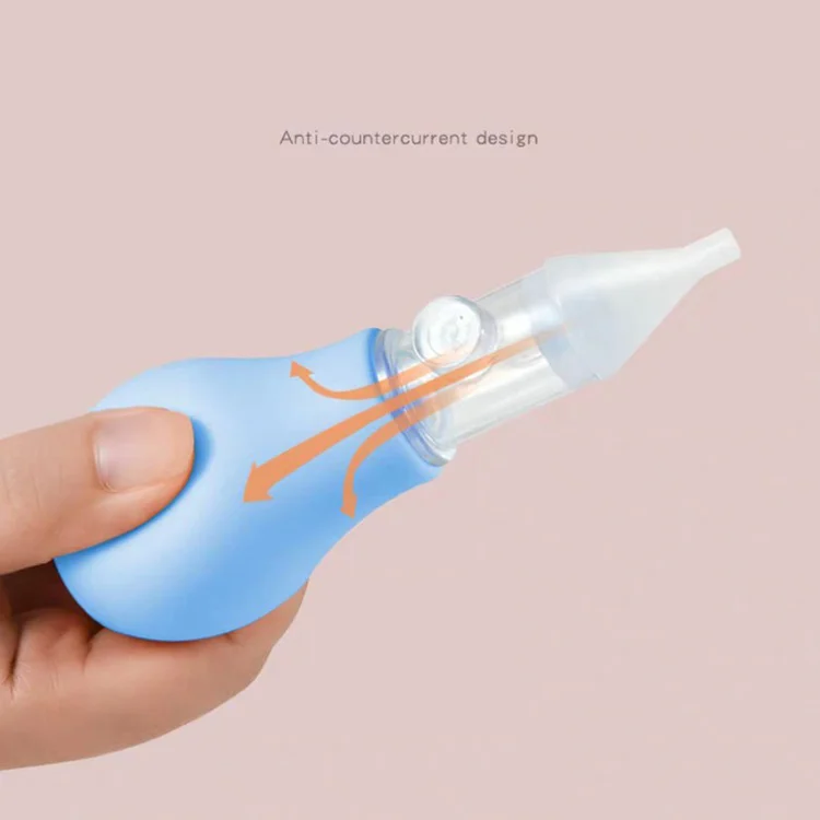Aspirator in use with a baby’s nose, demonstrating gentle insertion