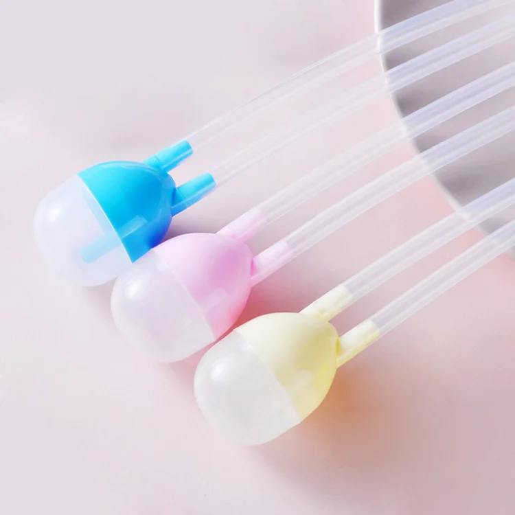Baby nose cleaner in use with a baby's nose, showing gentle insertion