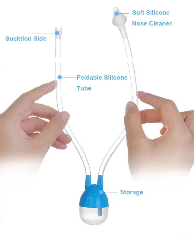 Baby nose cleaner laid flat on a surface with the suction tube extended