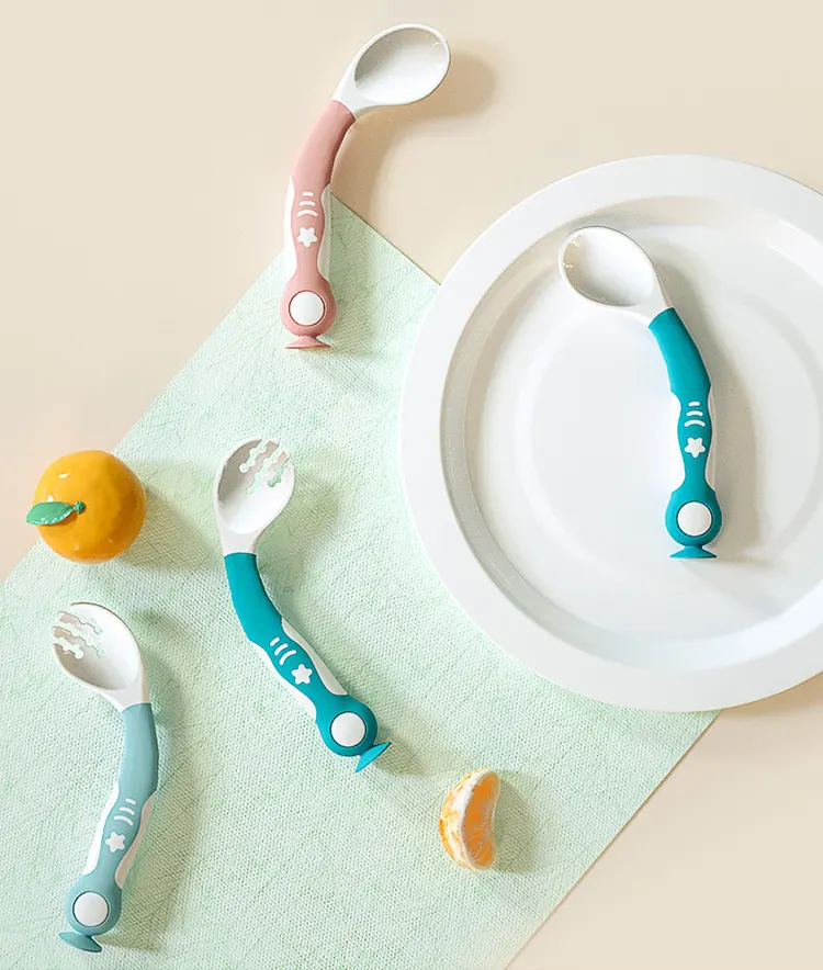 Close-up of the suction cup base on the bottom of the spoon and fork set
