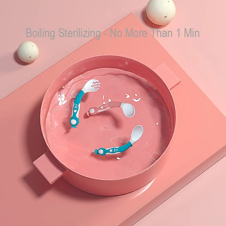 Spoon and fork set placed on a smooth surface with suction cup securely attached