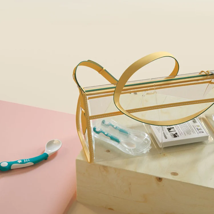 Baby spoon and fork set inside a PP storage box with lid closed