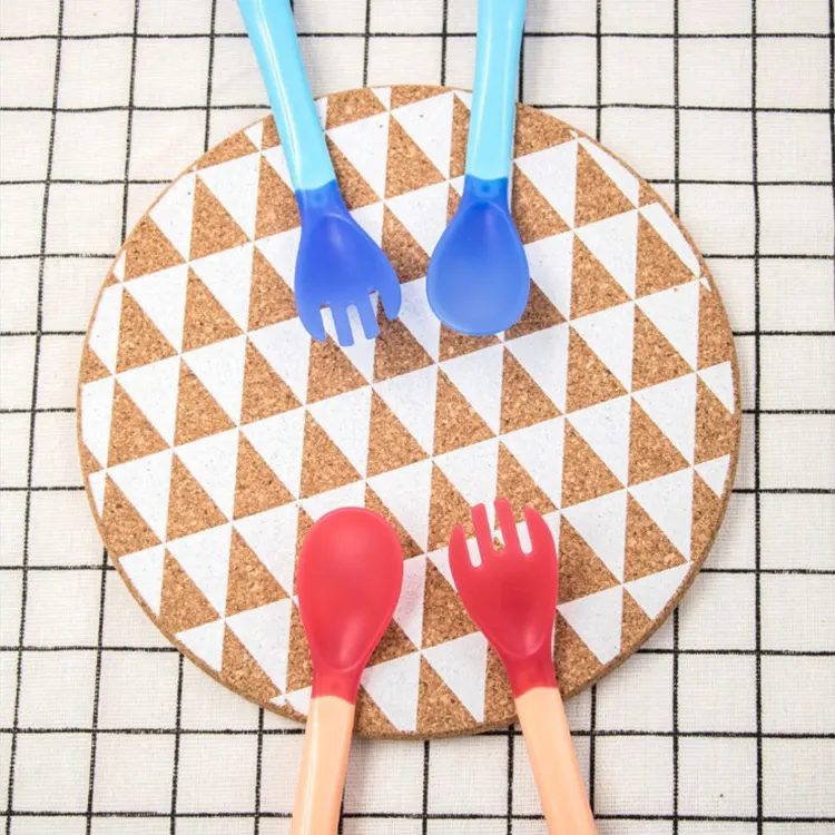 Baby spoon and fork set with soft TPE tips, open PP box showing all five pieces