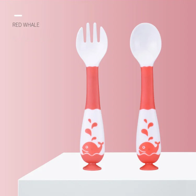 Green bendable spoon and fork set with handle bent forward at 90 degrees
