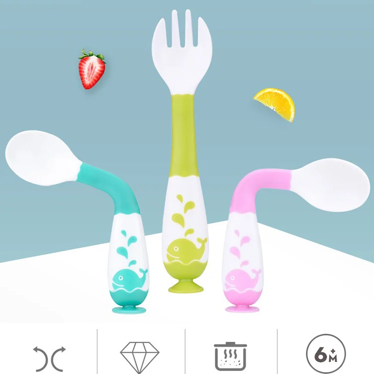 Spoon and fork set shown with non-slip silicone grip section
