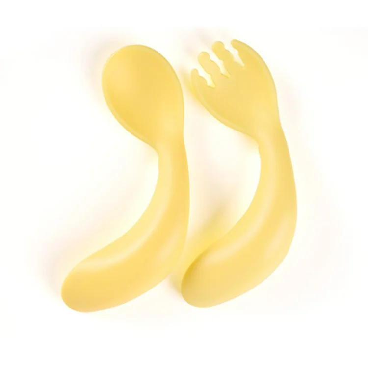 Curved fork with rounded tines and soft grip handle