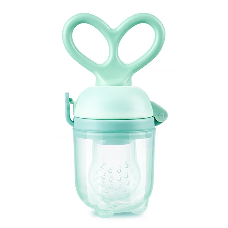 Adjustable baby food fruit feeder with two silicone capsule sizes, standing upright