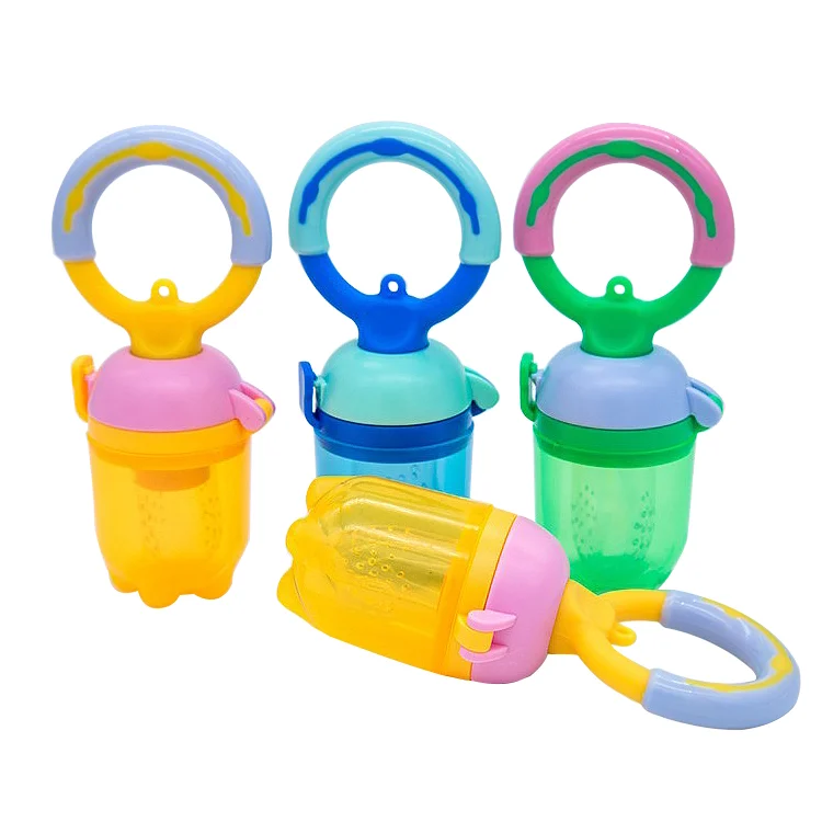 Baby fruit feeder pacifier with three mesh sizes attached, showing textured silicone surface