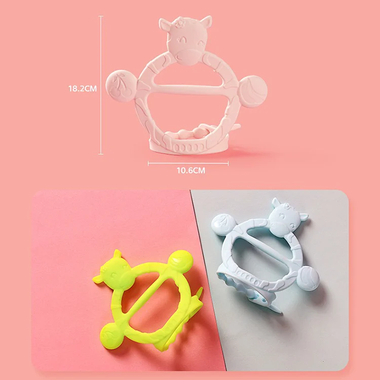 Cow-shaped teething bracelet in yellow, back view showing strap and closure