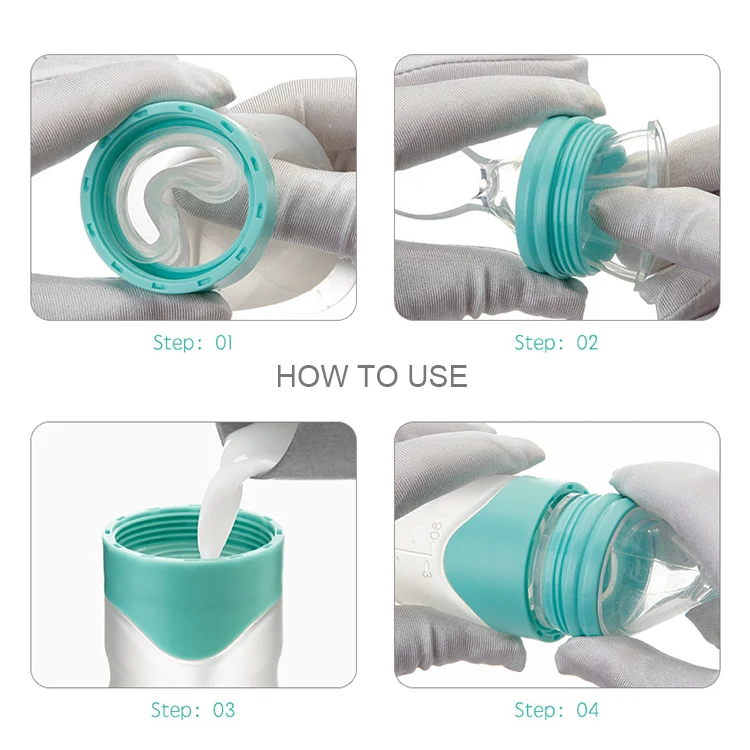 Squeeze spoon food feeder with both pink and green units side by side