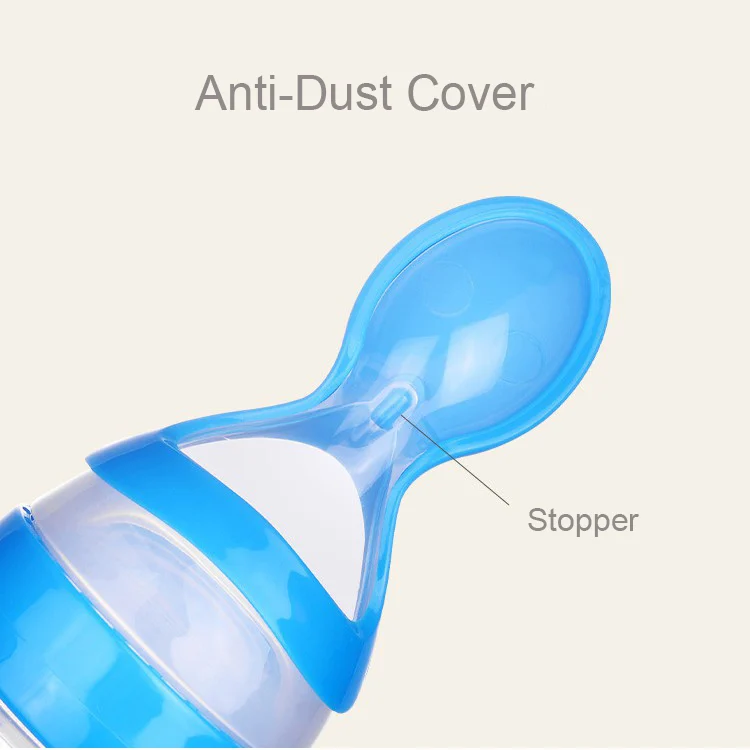Blue feeding bottle with the spoon head extended, filled with pureed food
