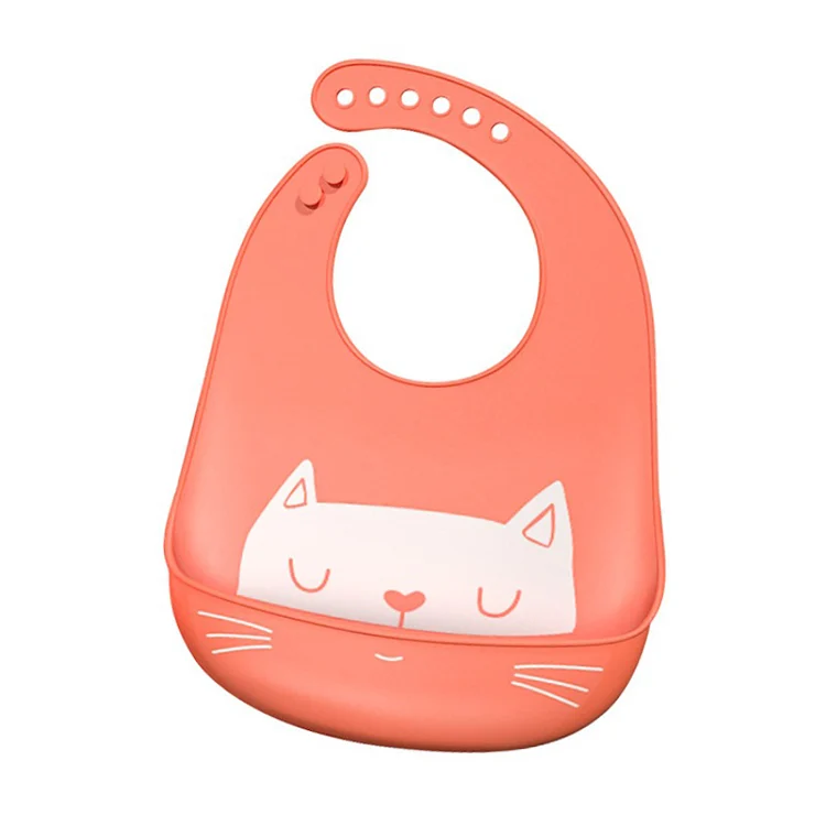 Soft waterproof silicone baby bib in white, worn on a baby's chest with adjustable neckband