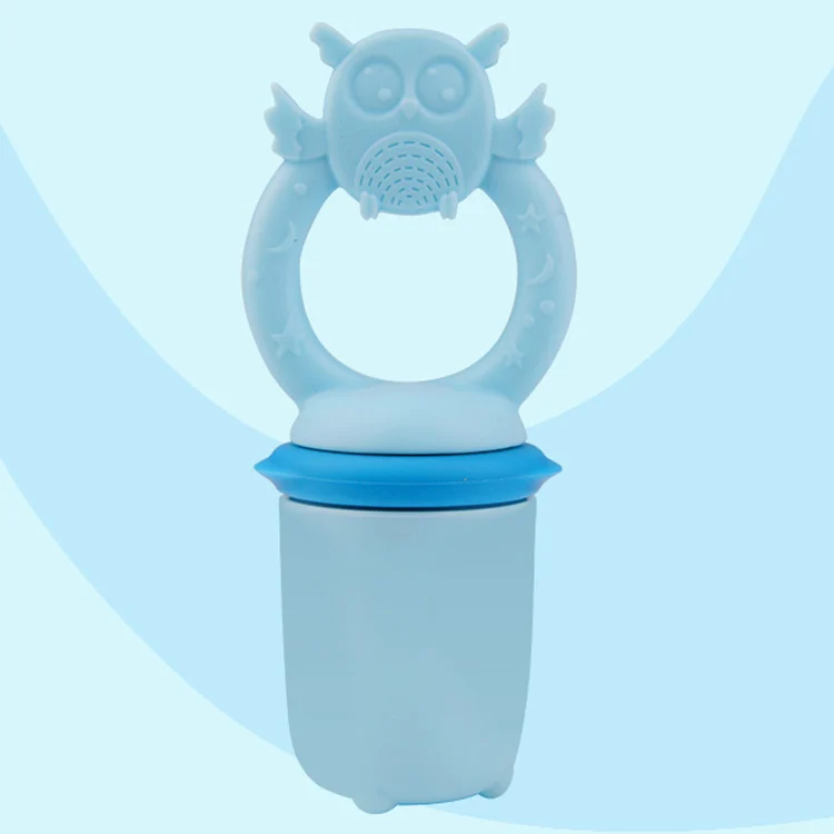 Lion-shaped silicone baby feeder pacifier standing upright on its feet