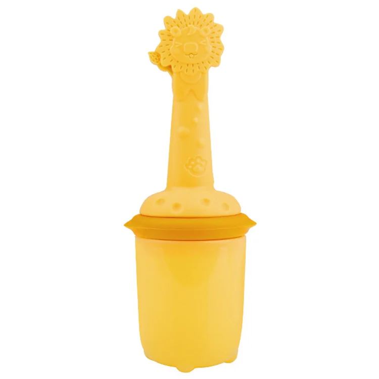 Close-up of the silicone pouch with small holes and food particles