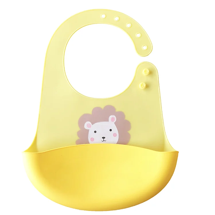 Silicone baby bib with the pocket open, showing its depth and capacity