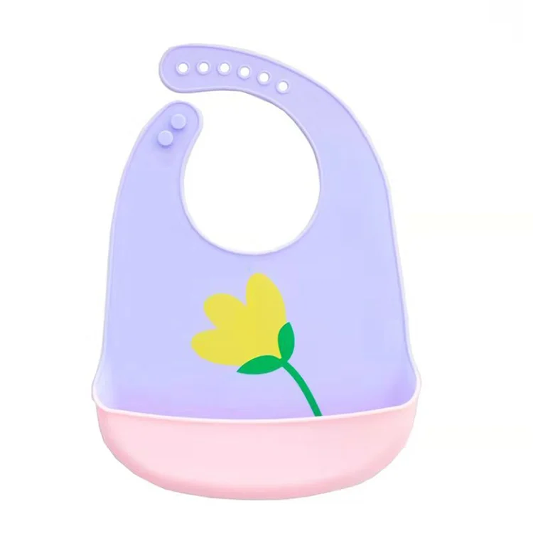 White silicone baby bib with adjustable neck buttons, side view