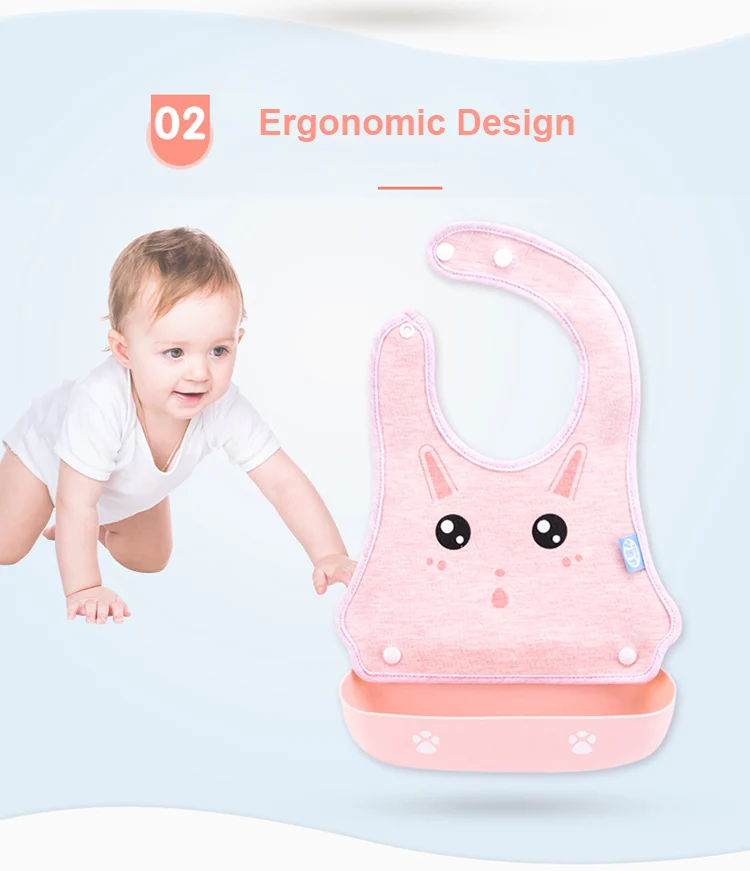 Baby bib laid flat with tray separated, showing the mould-resistant backing