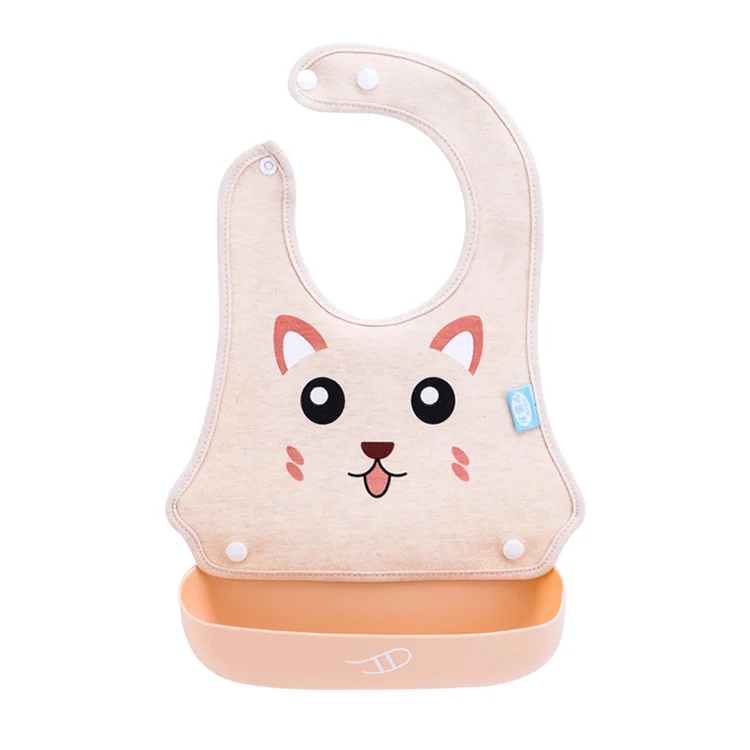 Green baby bib with tray removed, showing the soft neck seal
