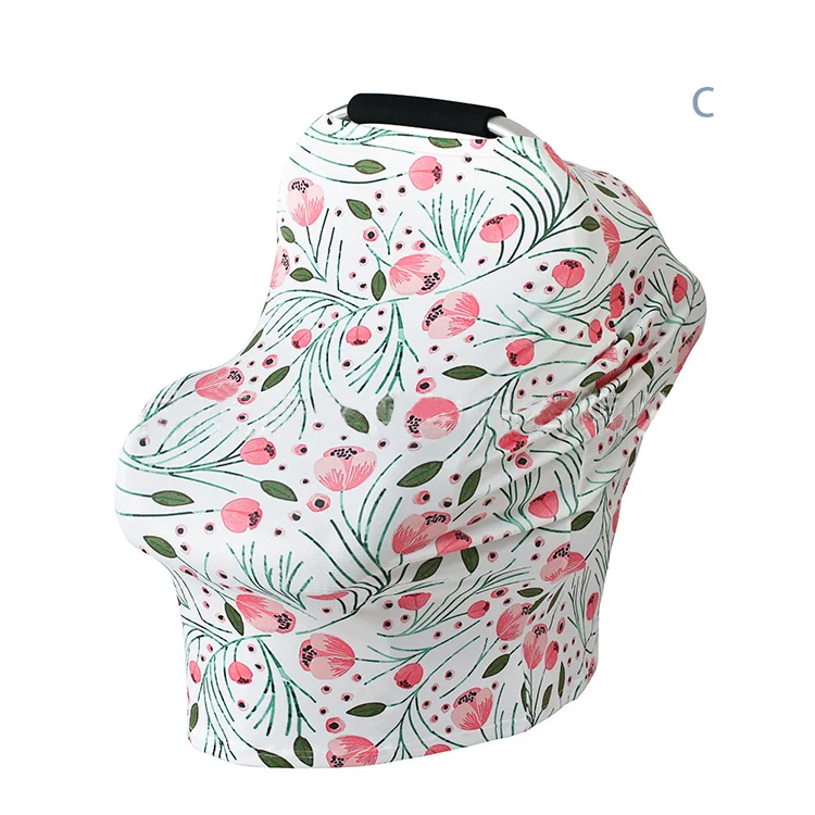 Nursing cover used as a car seat canopy, protecting baby from sunlight